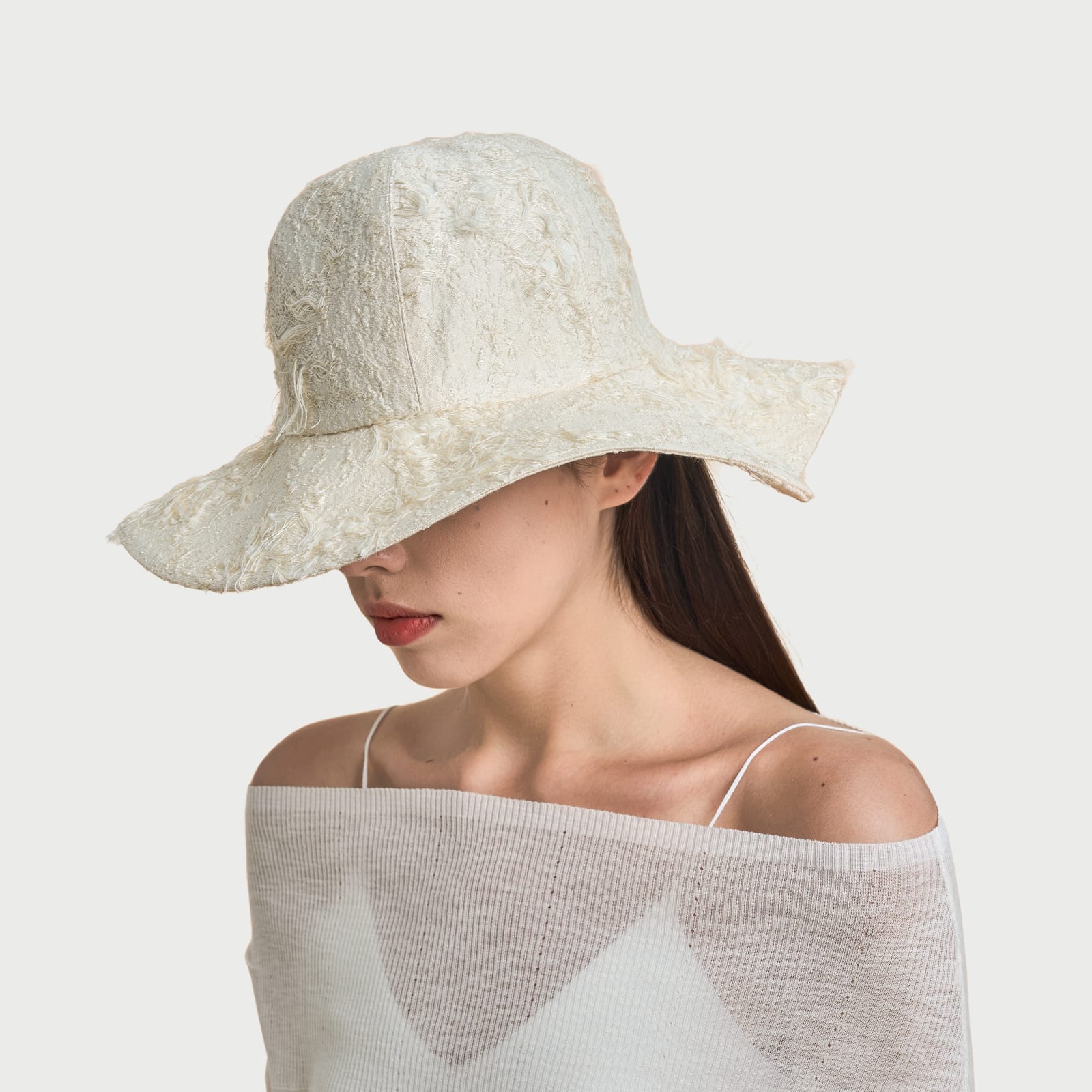 The Curve Paradox Eggshell White · Fringe view 3