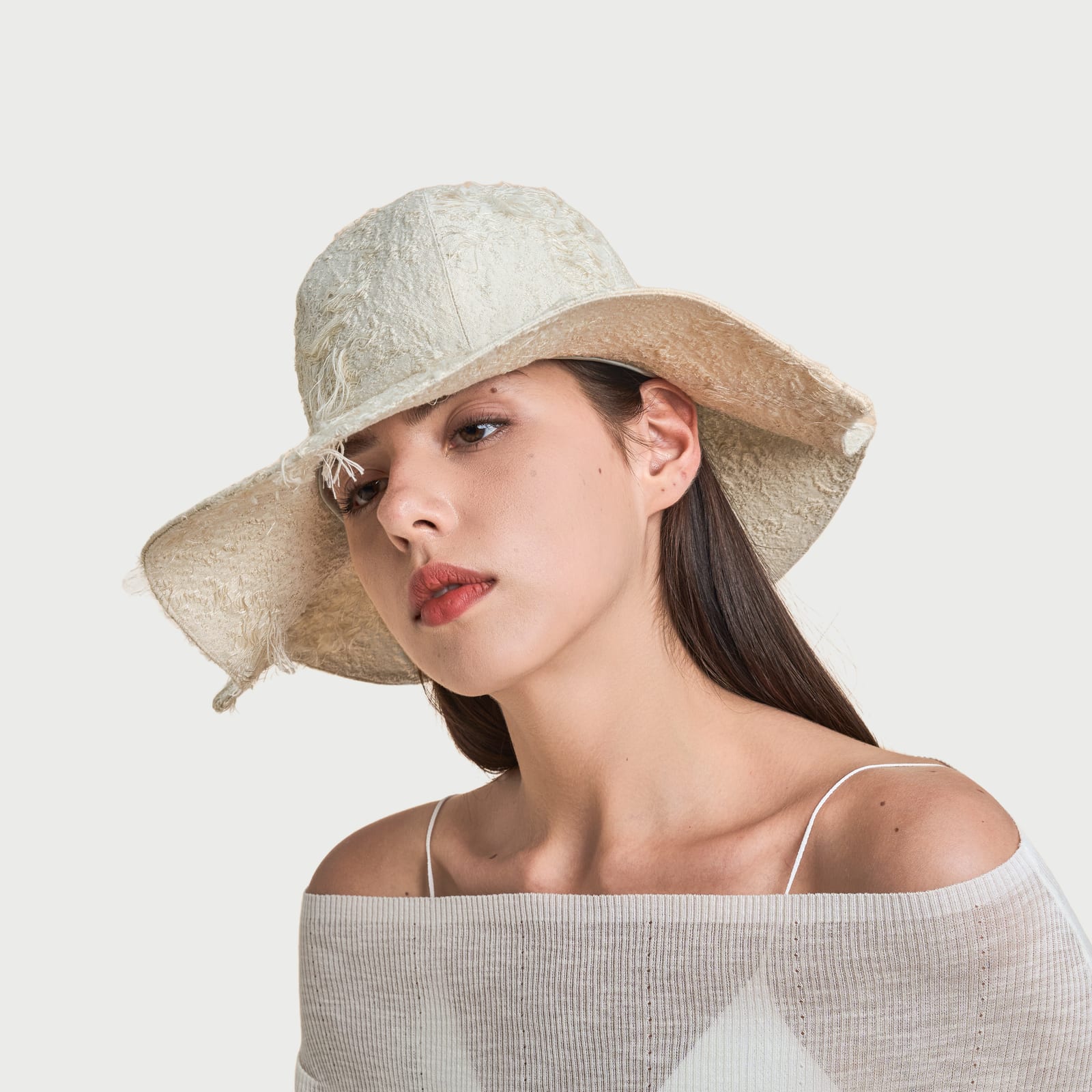 The Curve Paradox Eggshell White · Fringe view 4