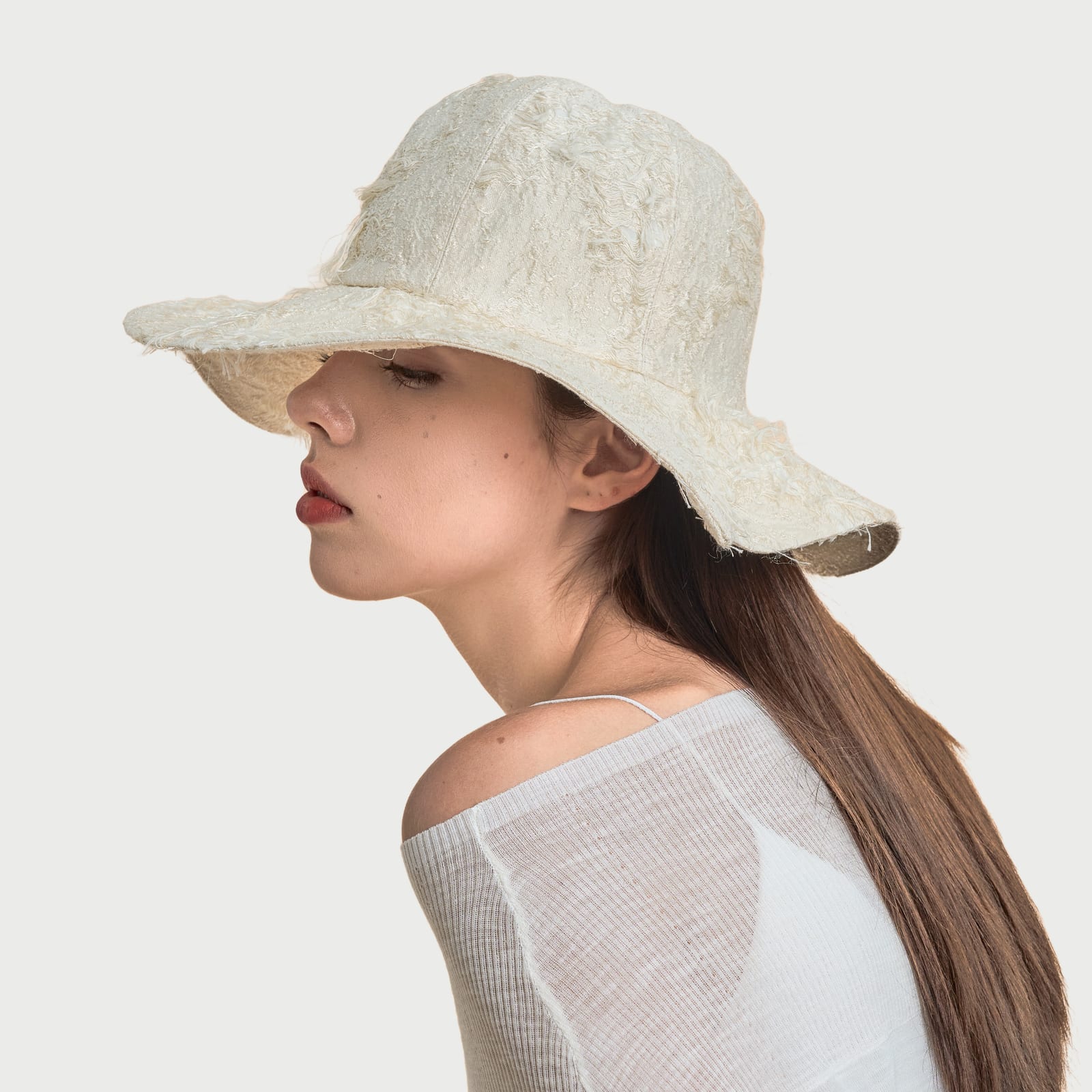The Curve Paradox Eggshell White · Fringe view 8