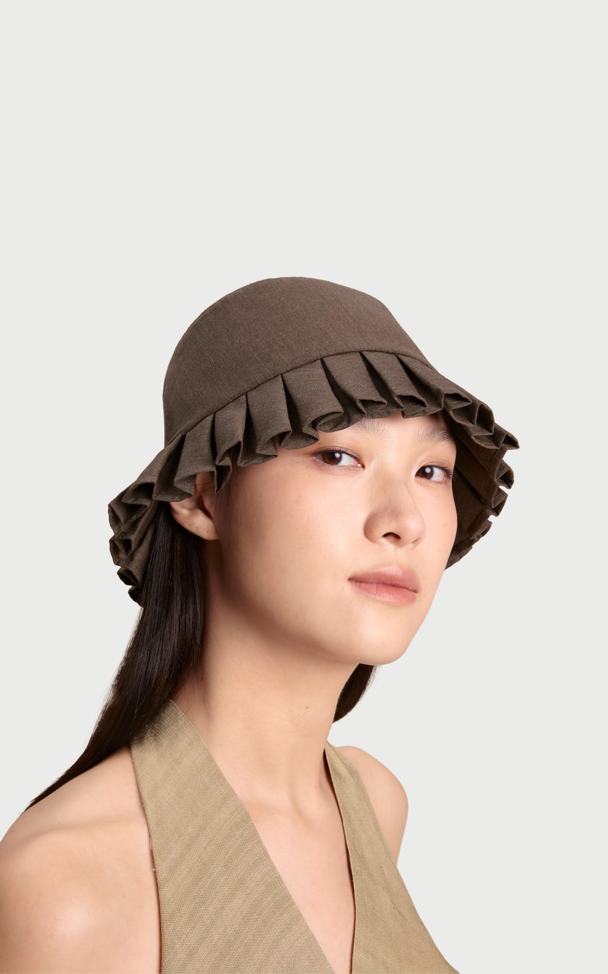 Dune Brown Petit Mouvement worn by a model