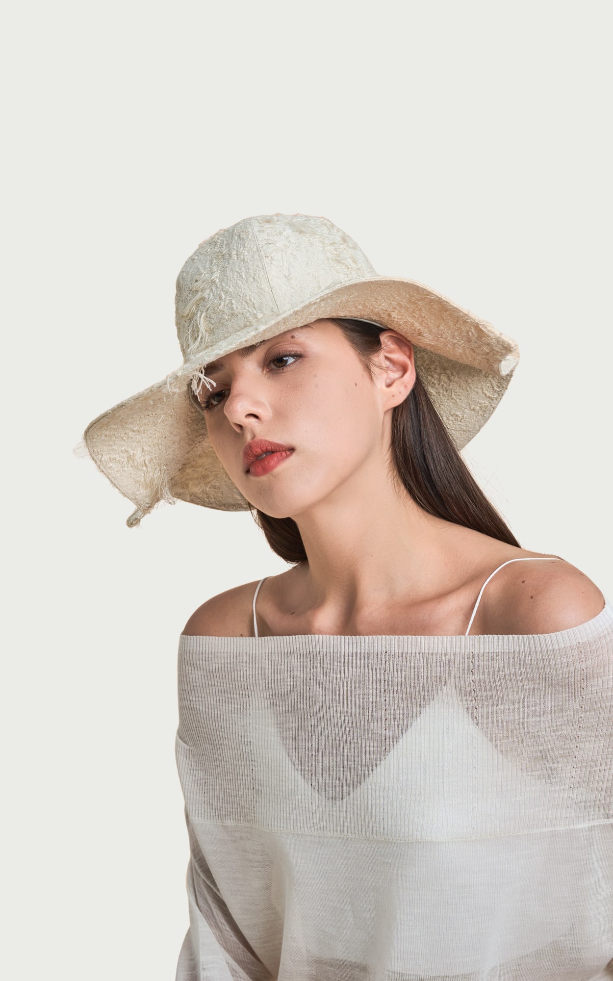 Eggshell White · Fringe Wide-brim Leaf Hat worn by a model