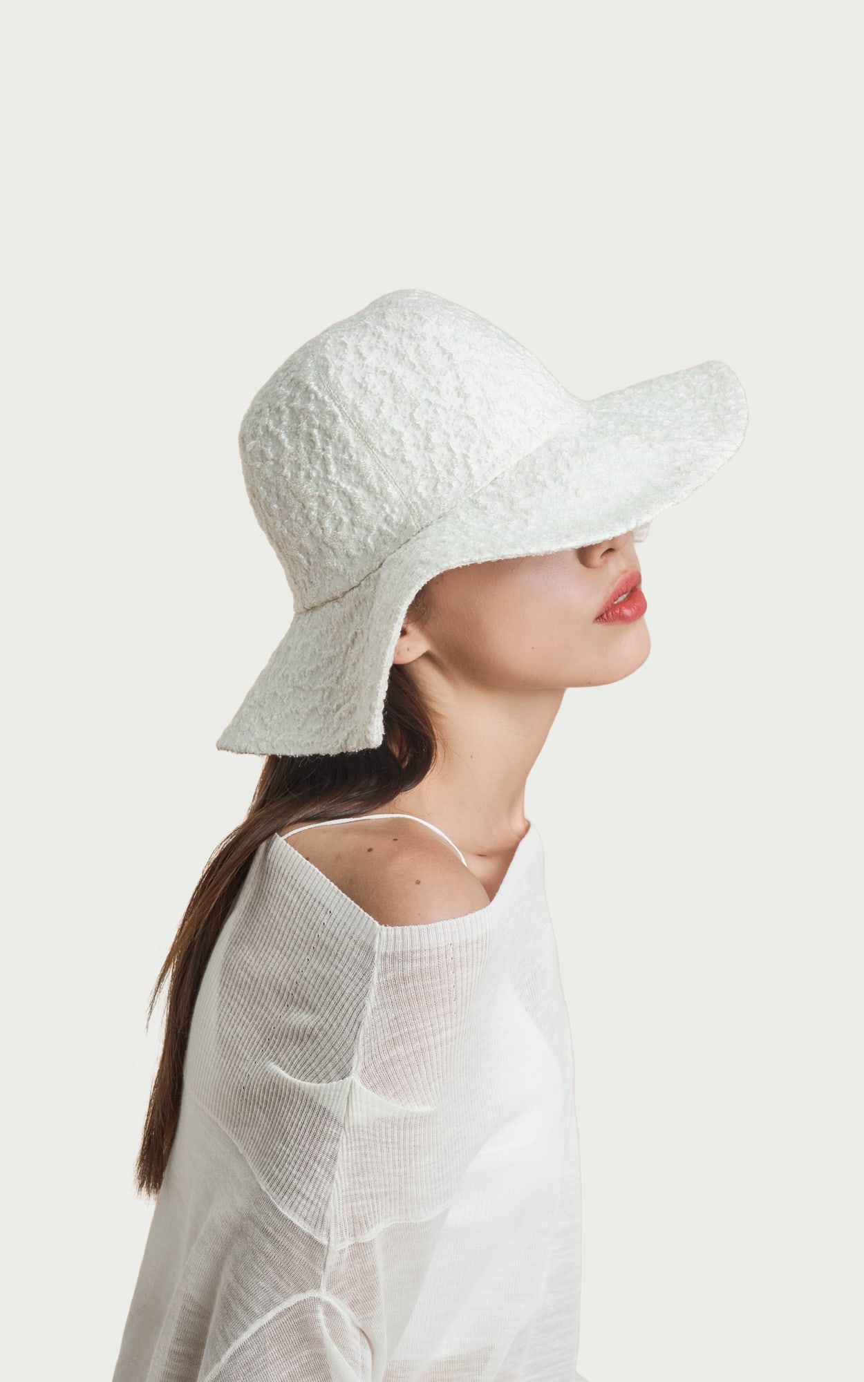 Eggshell White · Texture Wide-brim Leaf Hat worn by a model