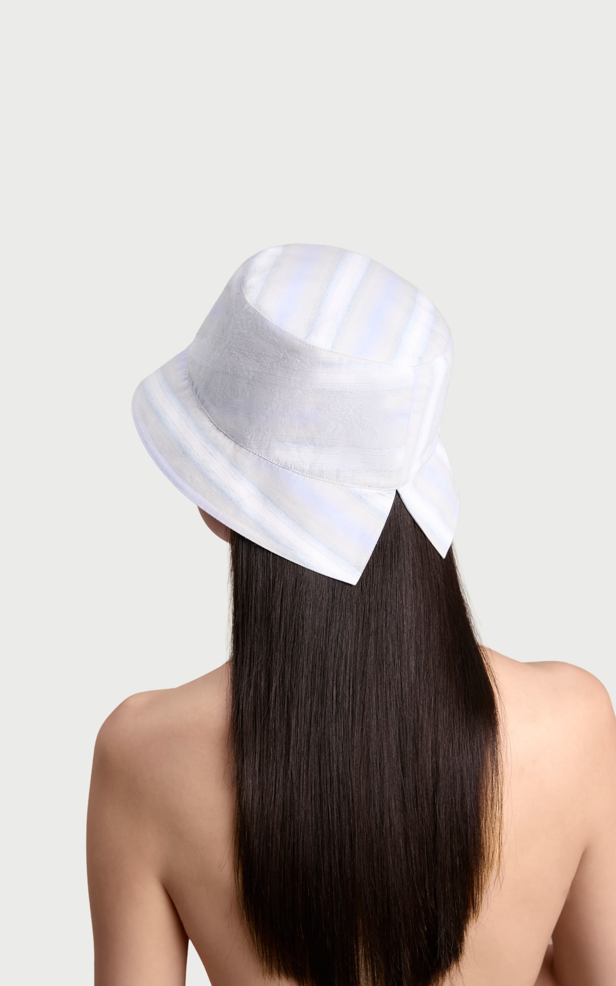 Blue White Stripe Slit-brim Bucket Hat worn by a model