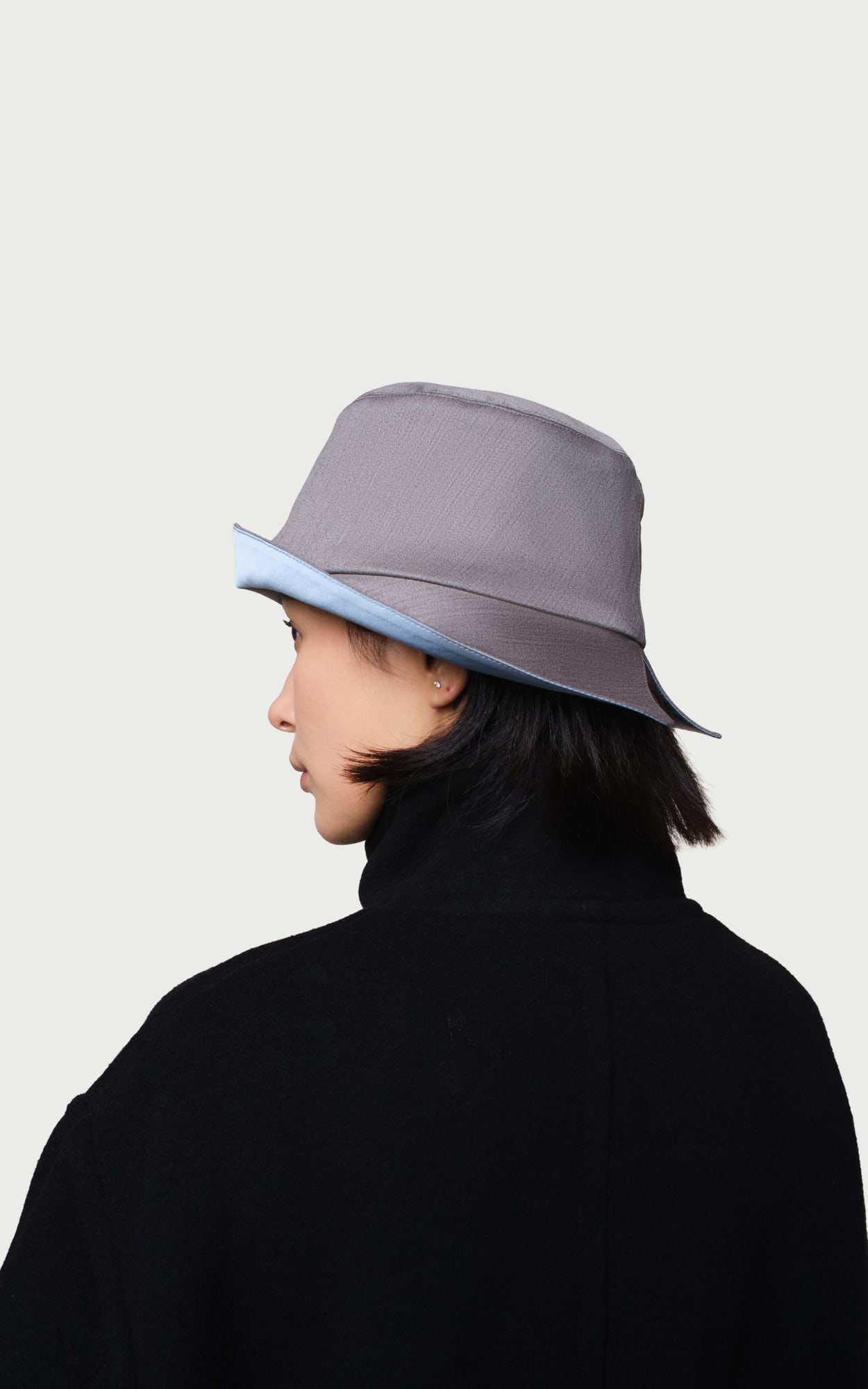Echo Slit-brim Bucket Hat worn by a model